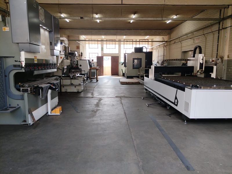 Press brake and fiber laser cutter for precision sheet metal work